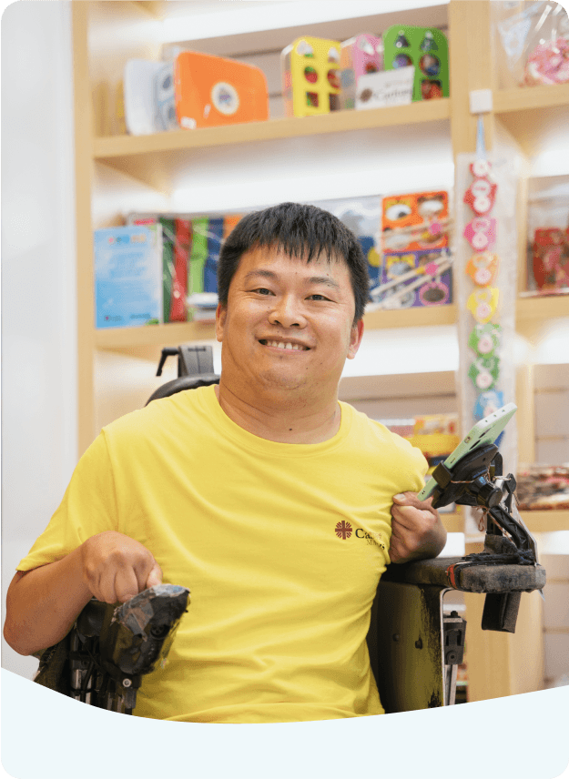 A photo of Sio Keong in a wheelchair